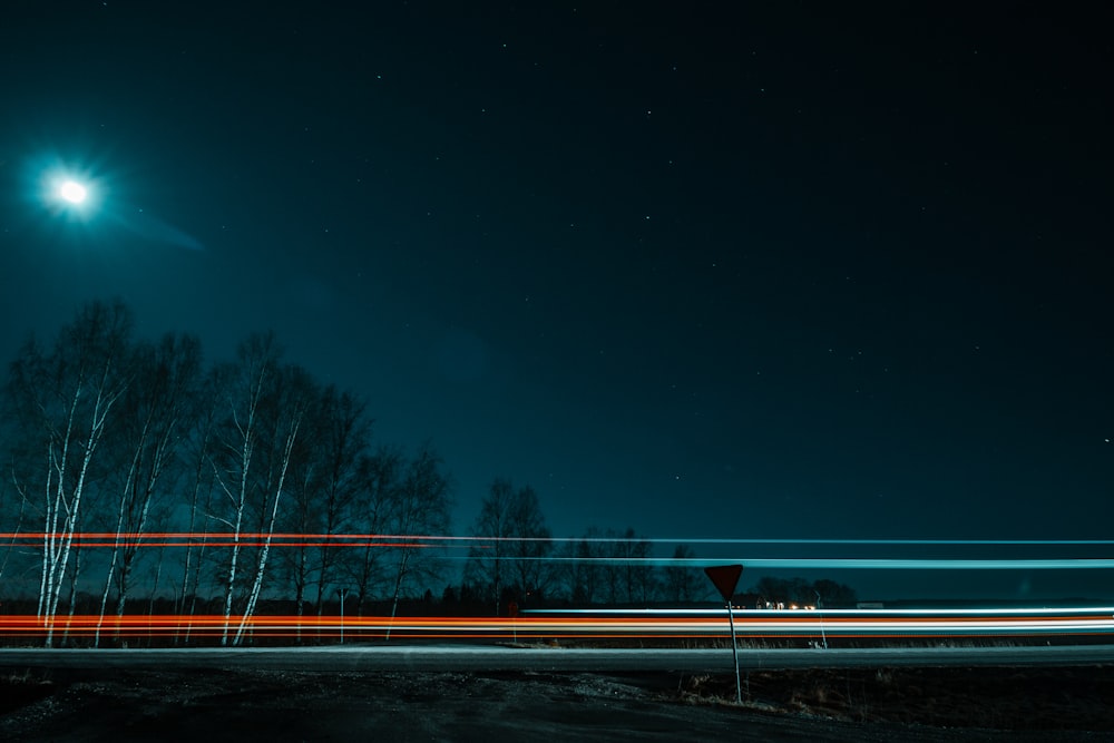 time lapse photography of road during night time