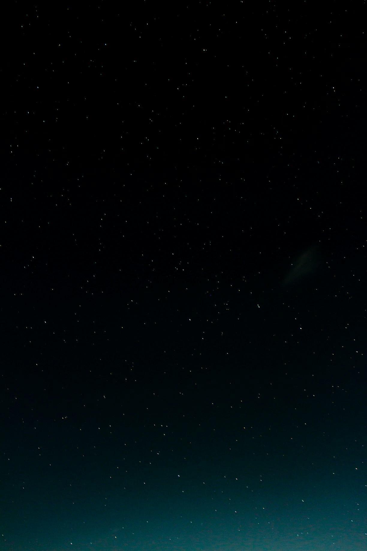 black and blue starry night sky