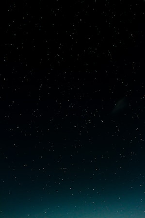 black and blue starry night sky
