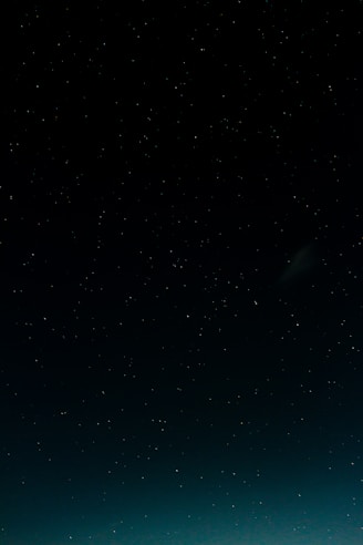 black and blue starry night sky