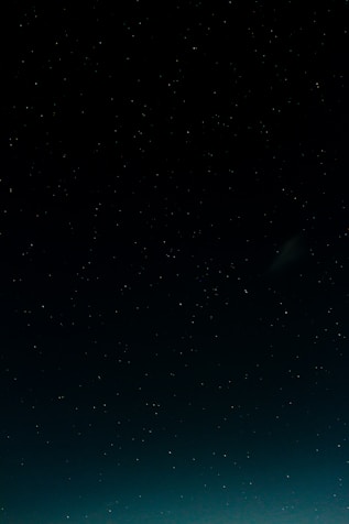 black and blue starry night sky