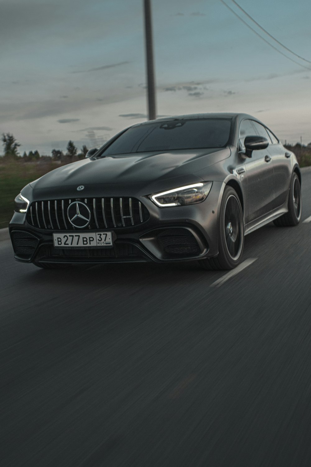 black bmw m 3 on road