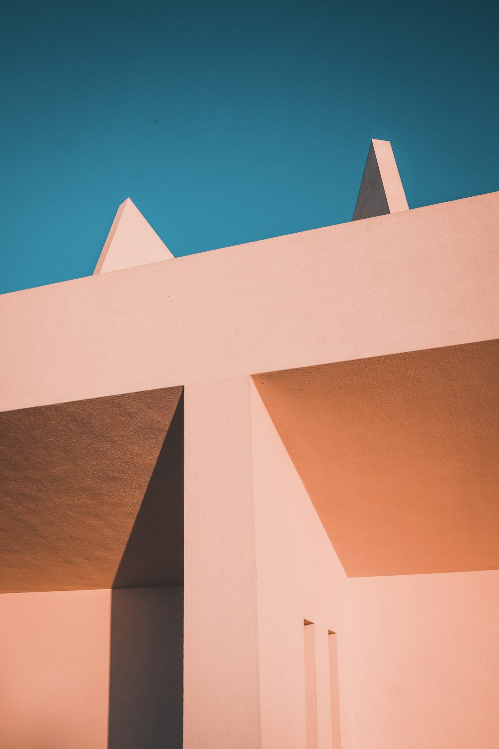 brown concrete building under blue sky during daytime