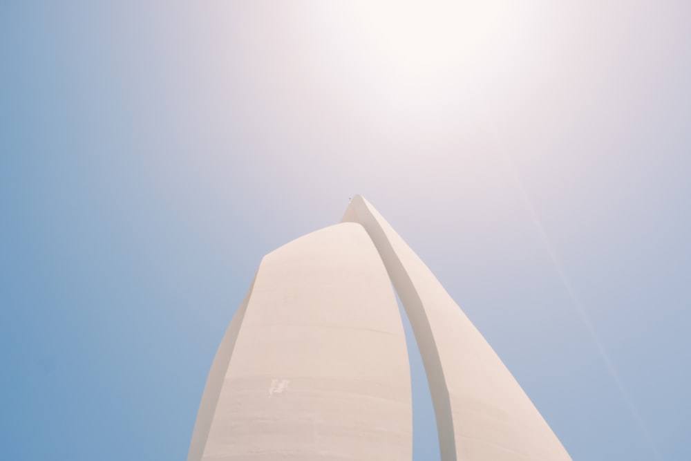 white concrete building under blue sky during daytime