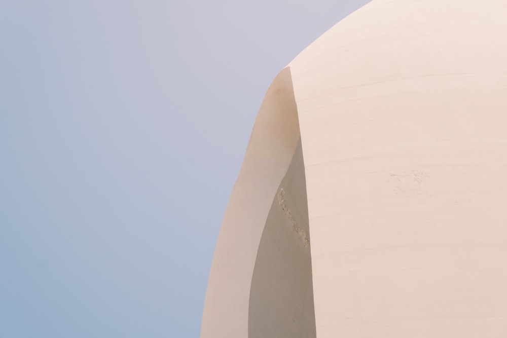 white concrete building under blue sky during daytime