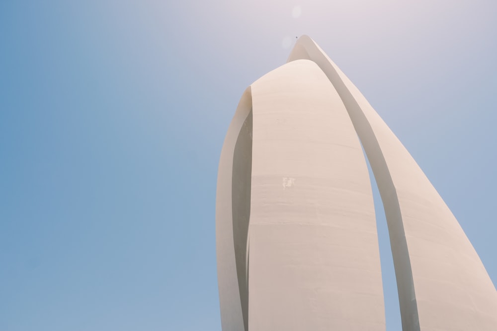 white concrete building under blue sky during daytime