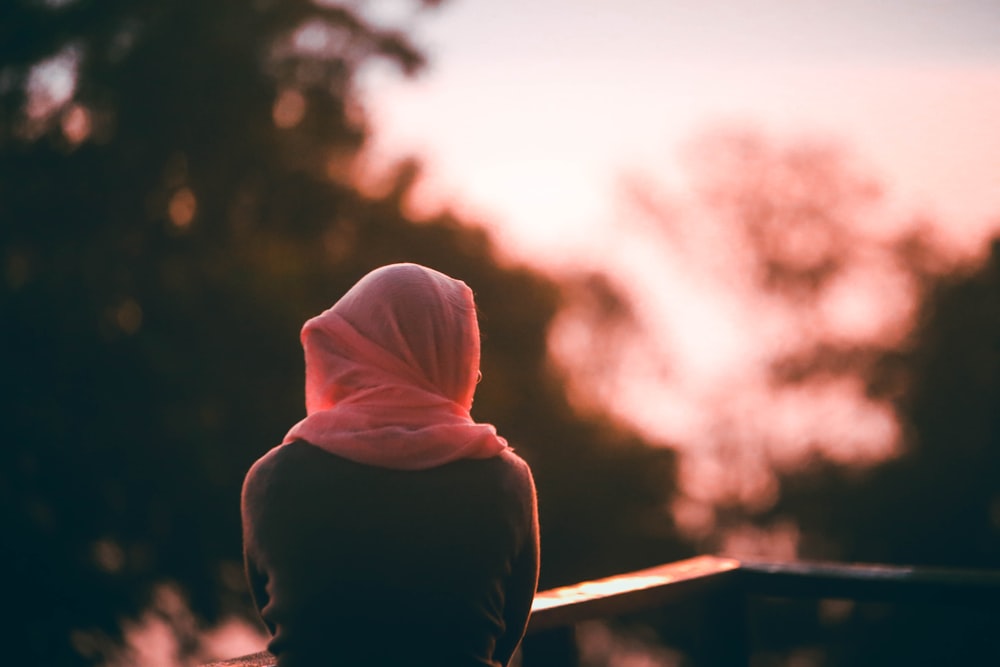 person in black hoodie jacket