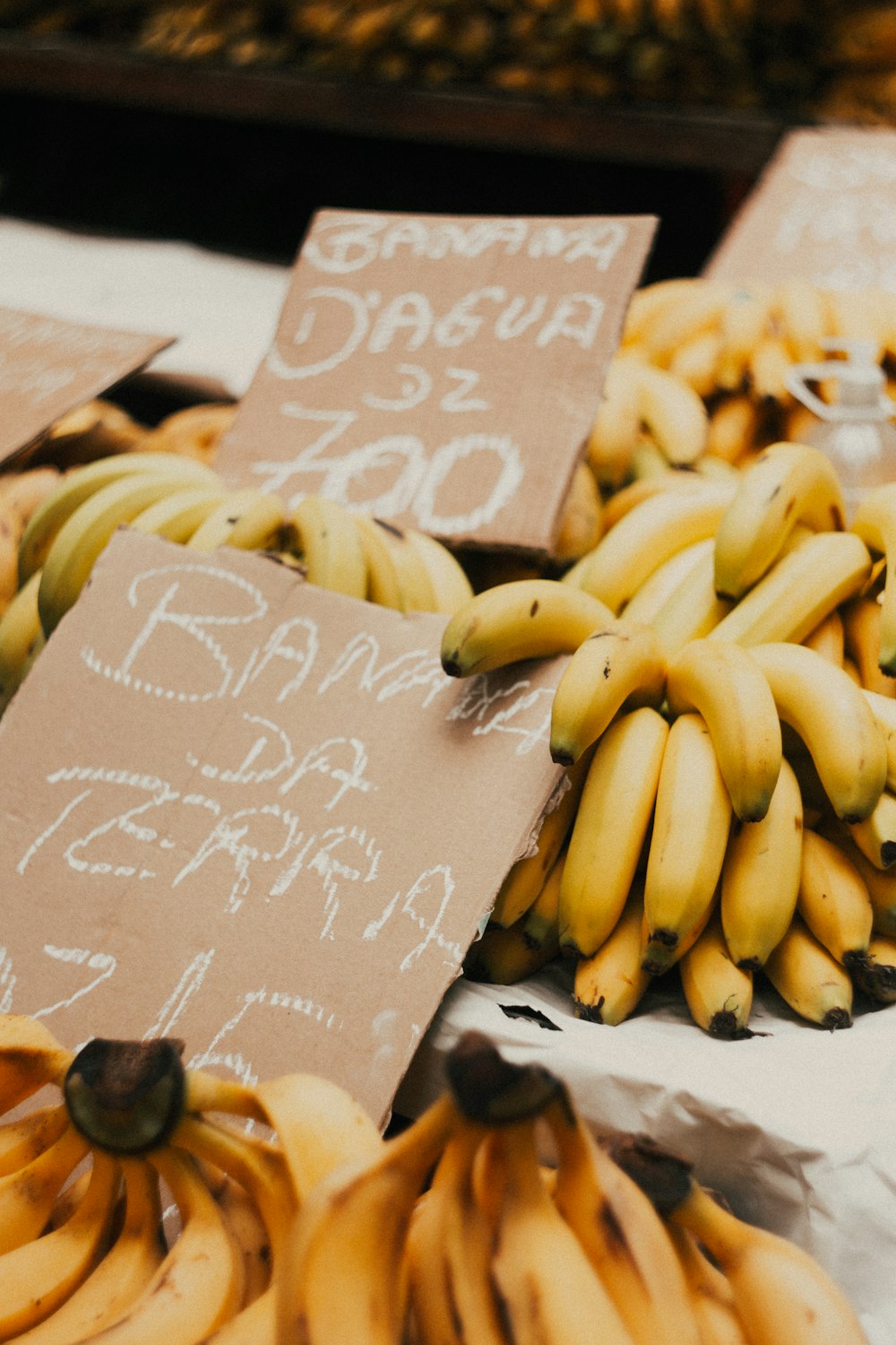 happy birthday greeting card beside yellow banana fruits