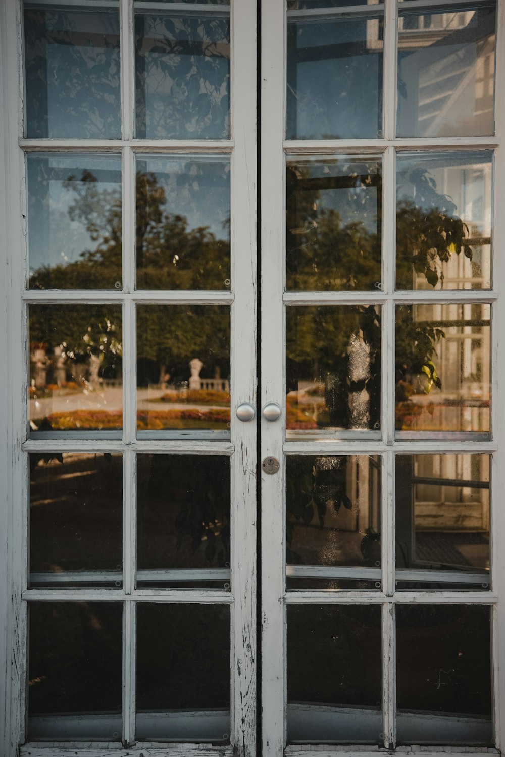 white wooden framed glass window