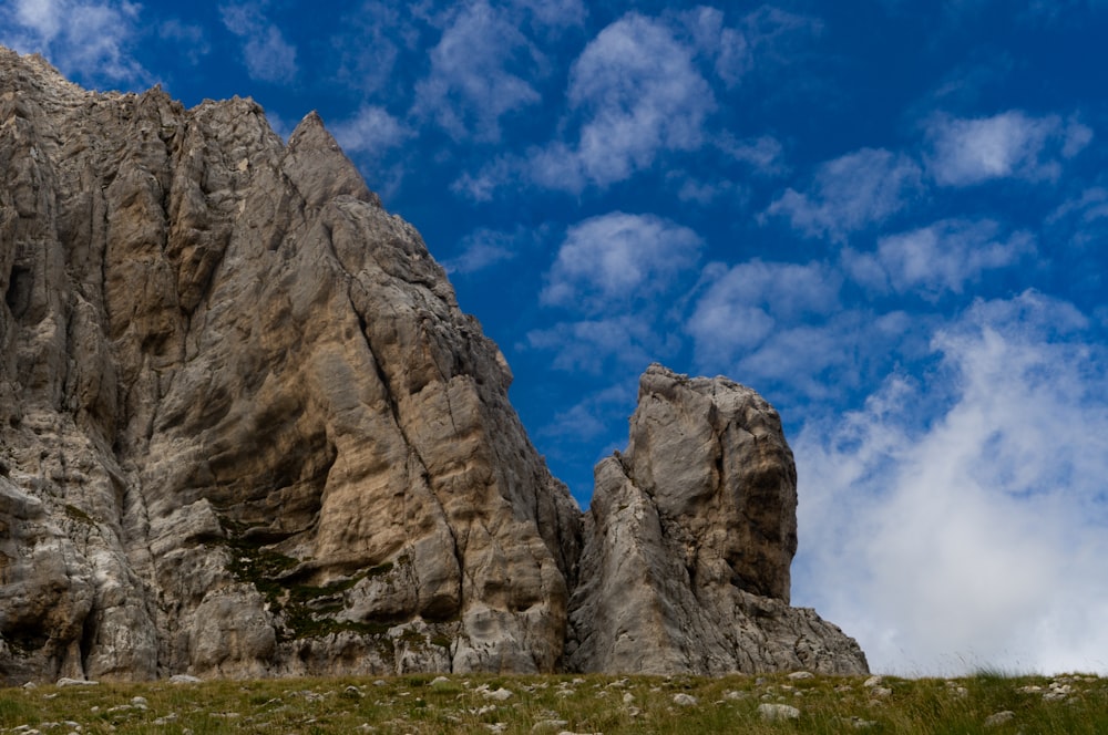 brown rock formation under blue sky during daytime