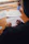 person writing on white paper