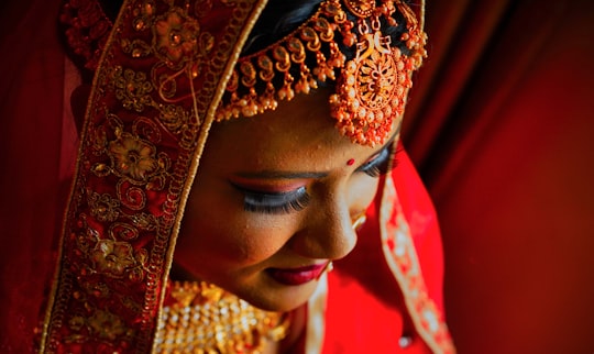 woman in red and gold hijab in Bengaluru India