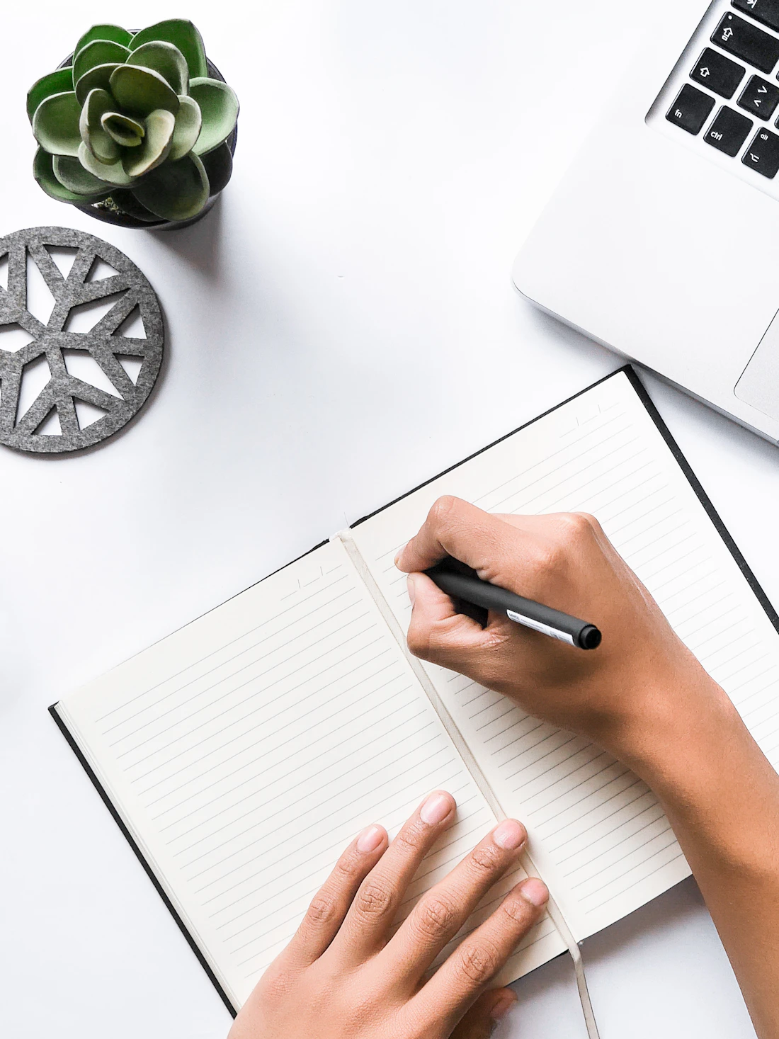 Writing in a notebook, taking learning one step at a time