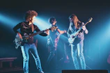man and woman playing guitars