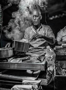 Close-up of a hot meal being prepared on a portable stove