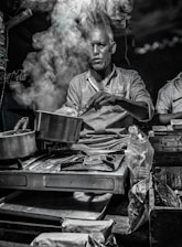 Close-up of a hot meal being prepared on a portable stove