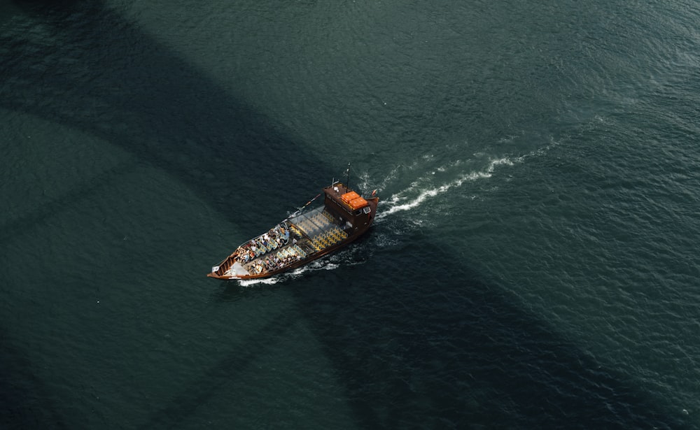 aerial view of boat on sea during daytime