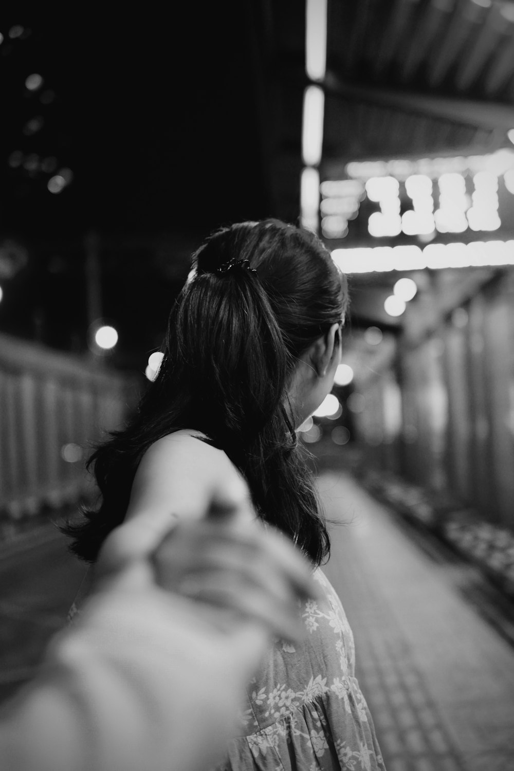 grayscale photo of woman in white shirt