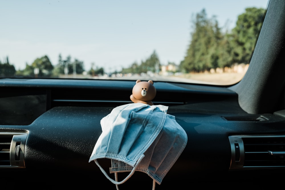 blue denim jacket on car