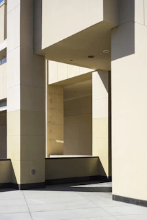 Geometric architectural detail inspired by Mayan design with strong shadows.