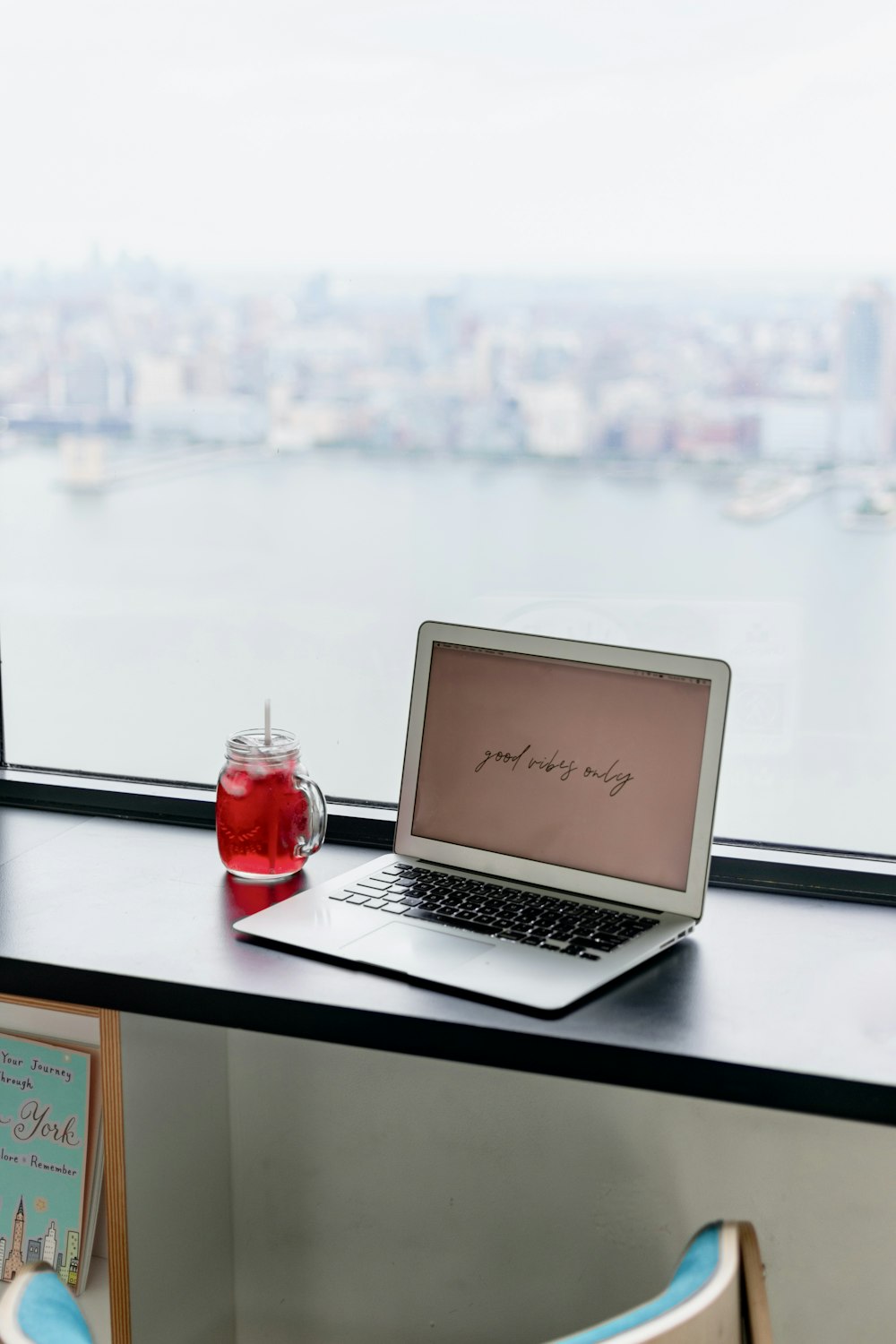 macbook air on white table