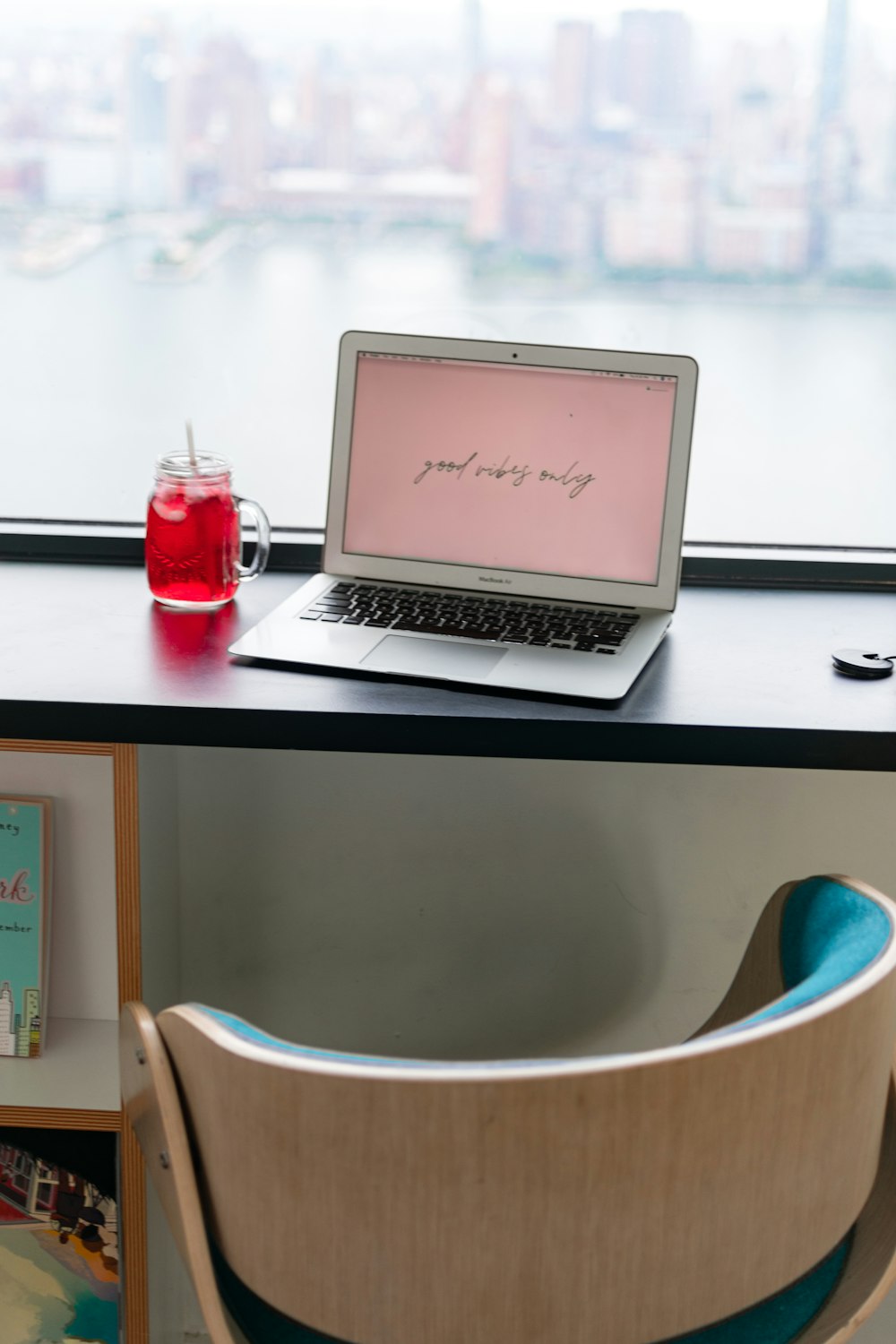 macbook air on white table