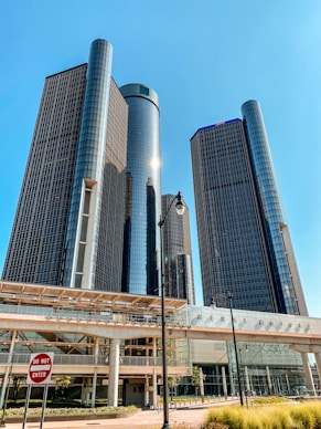blue glass walled high rise building