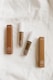 two white and brown tube bottles