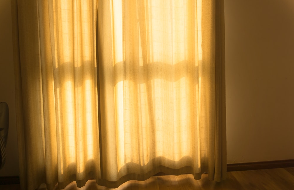 white window curtain during daytime