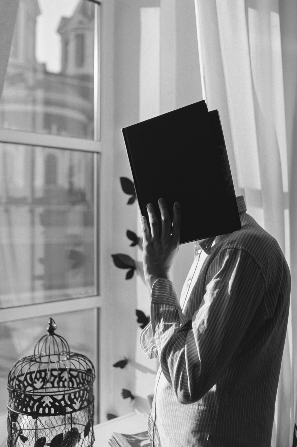 person holding black tablet computer