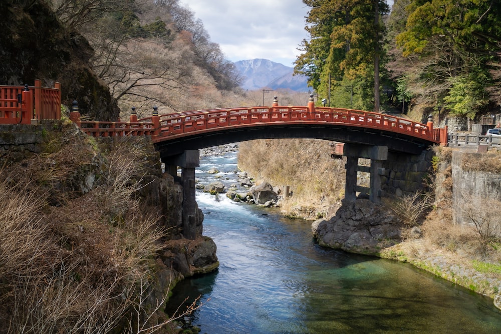 brown bridge over river during daytime