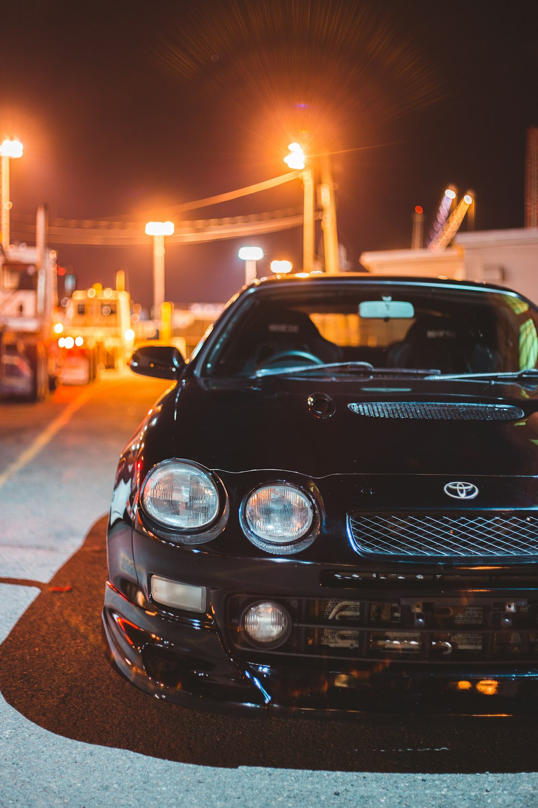 black mercedes benz car on road during night time