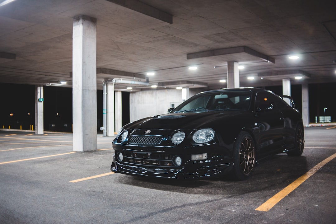 black bmw m 3 parked in garage