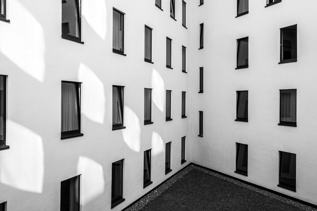 white concrete building with black floor