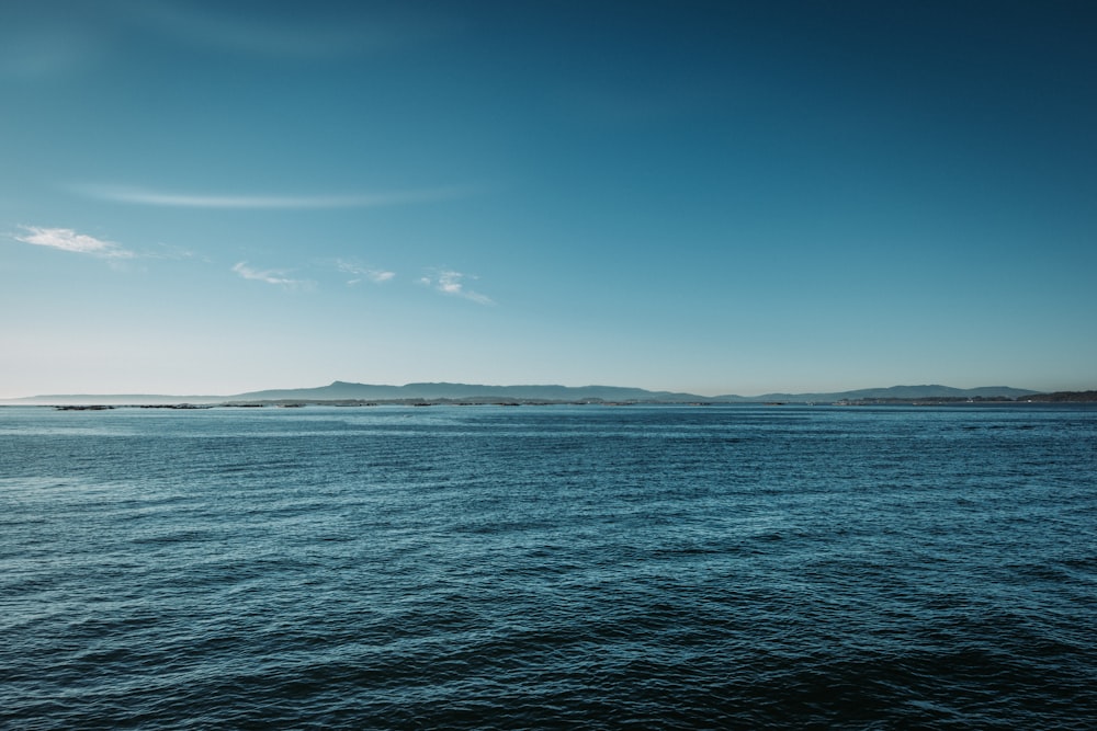 blue sea under blue sky during daytime