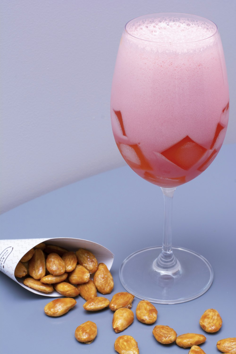 clear wine glass with red liquid