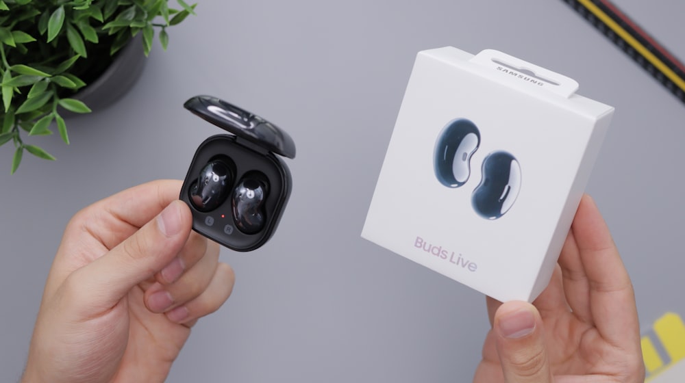 black and gray bluetooth earbuds box