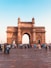 people walking on arch gate during daytime
