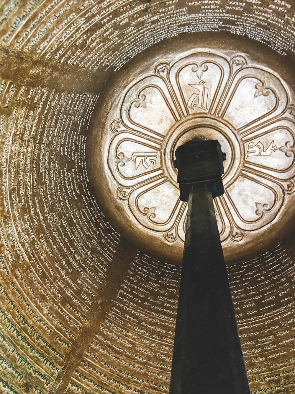 black and gold round ceiling