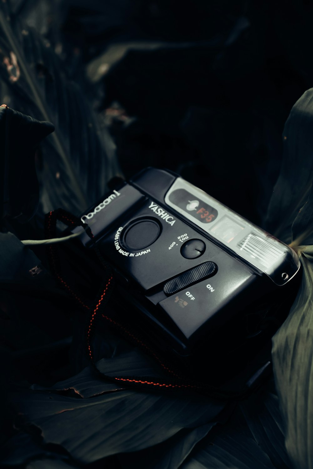 black and silver point and shoot camera
