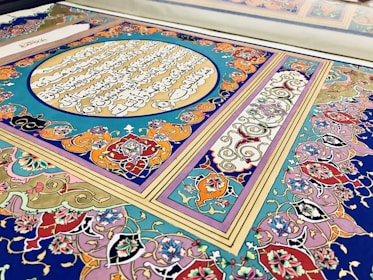 Traditional Bosnian calligraphy art featuring Quranic verses, symbolizing spiritual strength and peace.