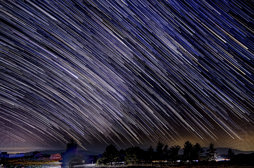 time lapse photography of city lights during night time