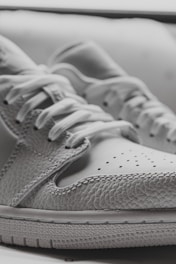 A close-up of breathable shoe material showcasing flexibility.