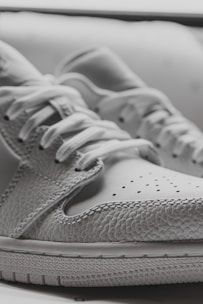 A close-up of breathable shoe material showcasing flexibility.