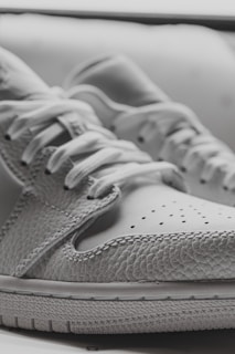 Close-up of textured PU material highlighting shoe details.