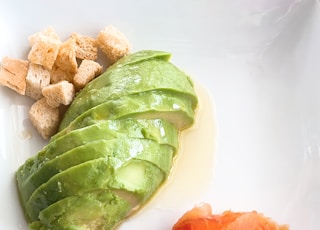 sliced vegetables on white ceramic plate