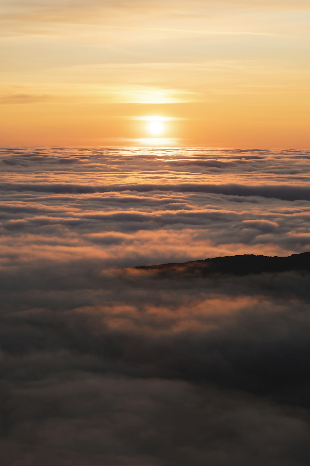 clouds and sun during sunset