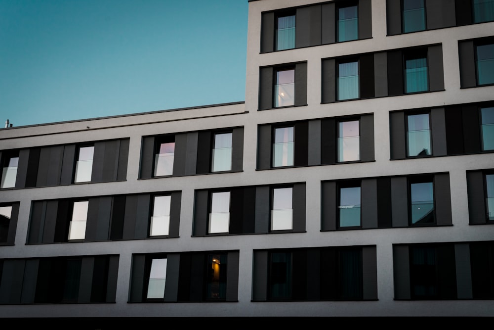 white concrete building under blue sky during daytime