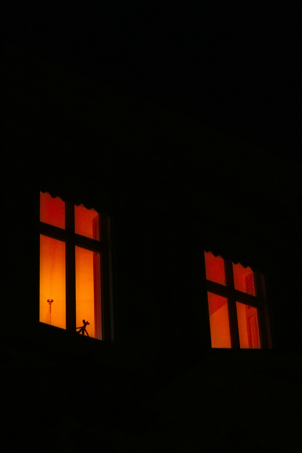 brown wooden framed glass window