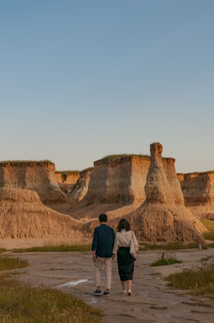 A couple exploring a beautiful landscape in India.